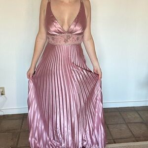 Pink maxi dress with beaded bodice and pleated skirt